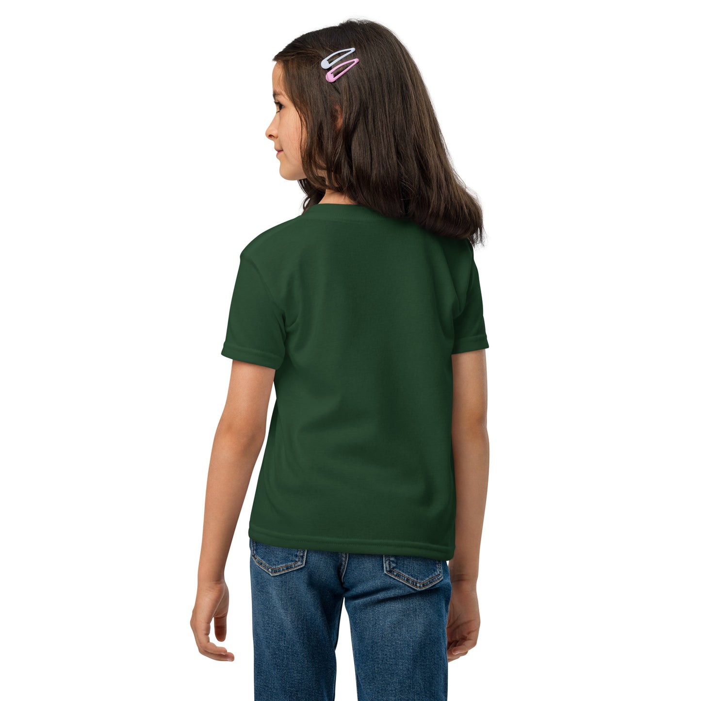 Child wearing a green t-shirt and blue jeans on a white background