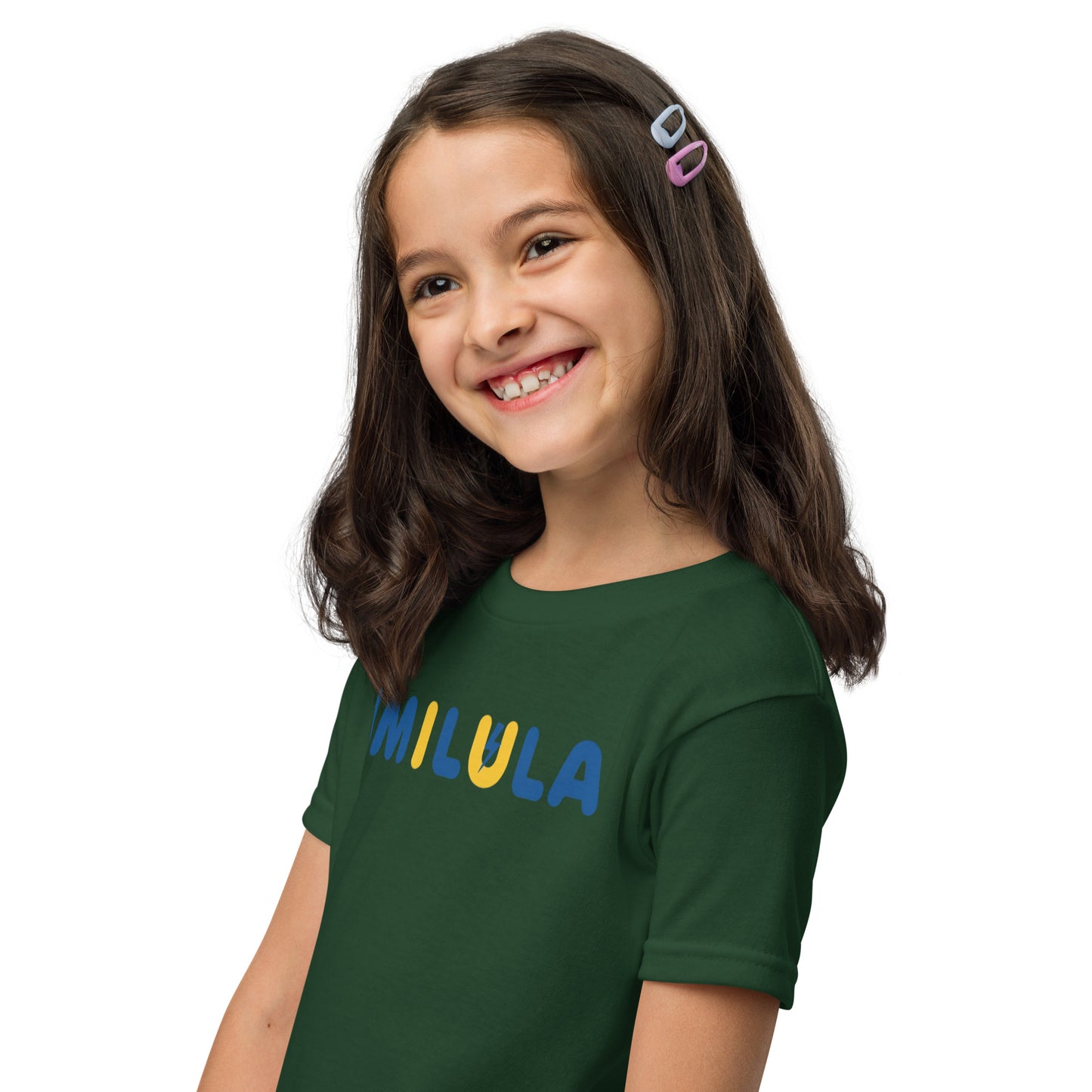 Young girl wearing a green t-shirt with 'Chosen' text on a white background