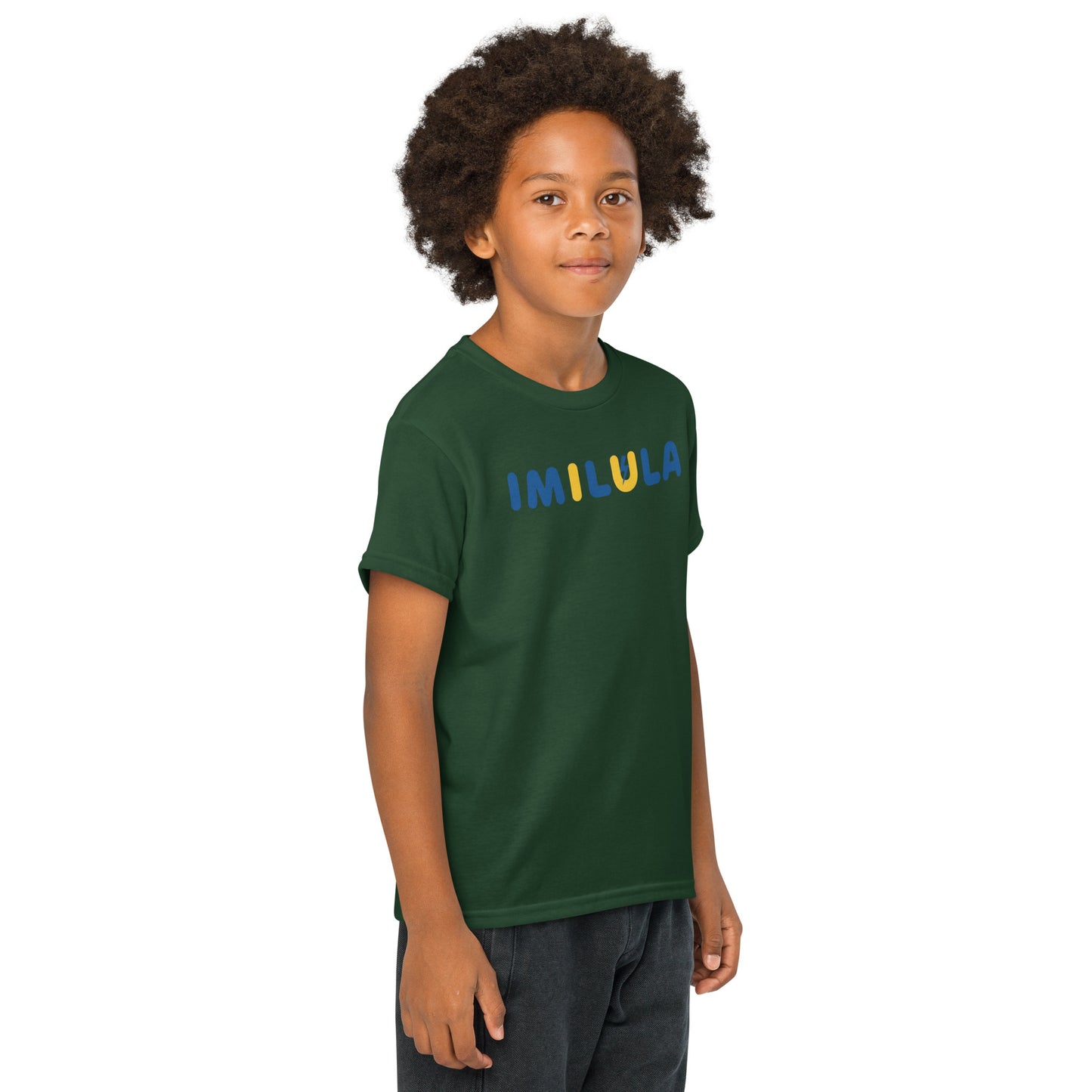Child wearing a green t-shirt with 'IMILULA' text on a white background