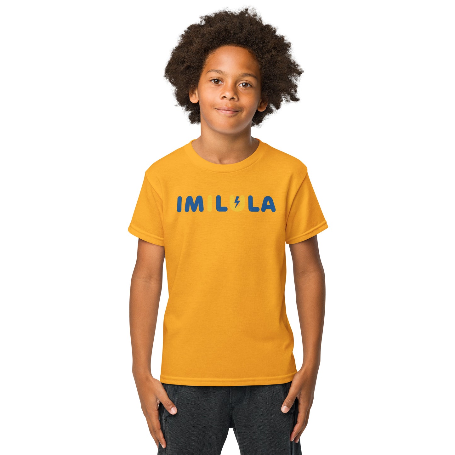 Child wearing a yellow t-shirt with 'IM LILA' text on a white background