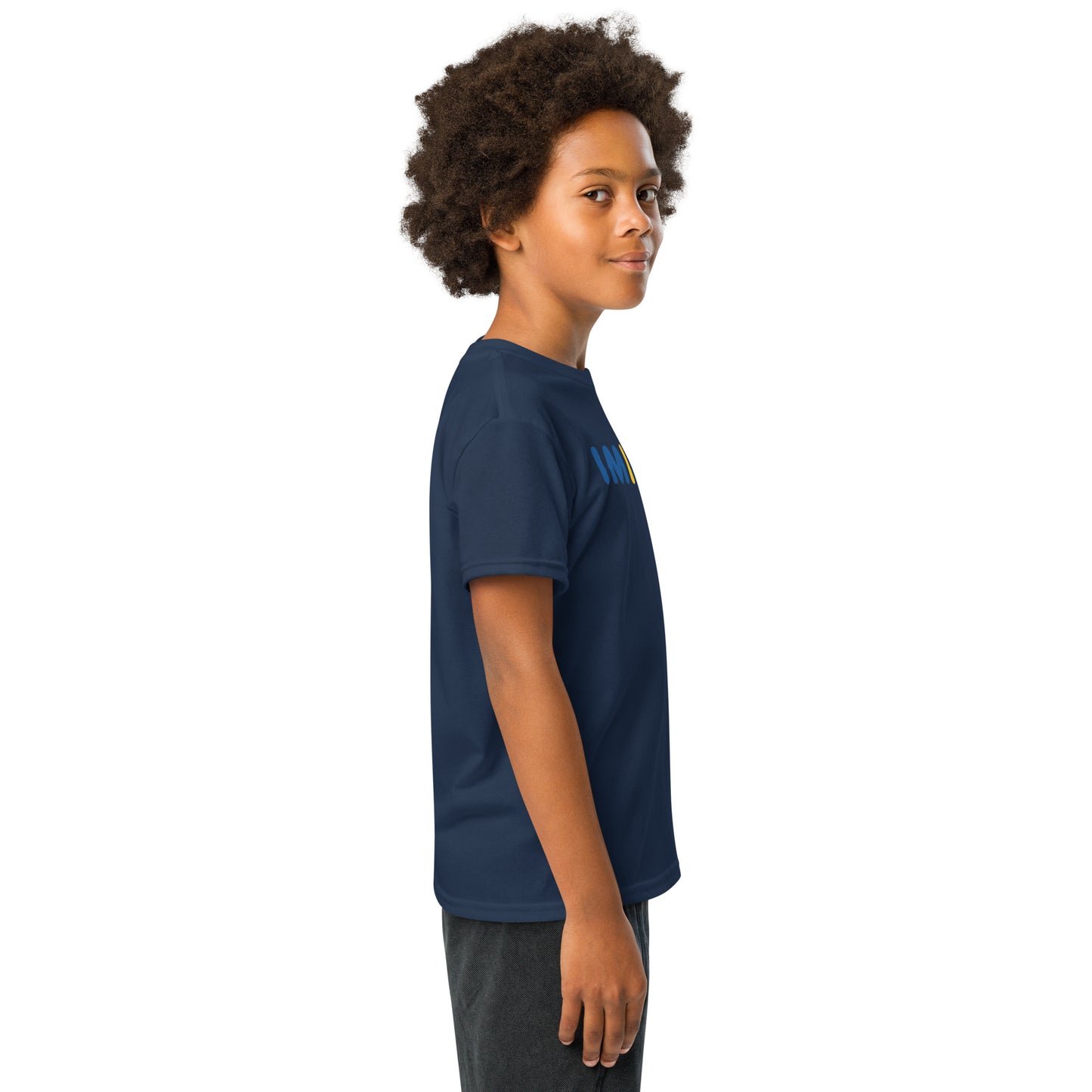 Child wearing a navy blue t-shirt with yellow graphics on a white background