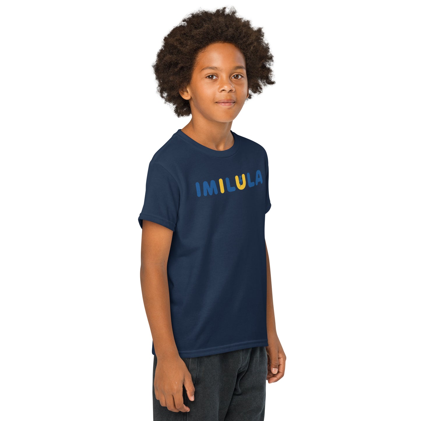 Child wearing a navy blue t-shirt with 'IMILULA' printed on it against a white background