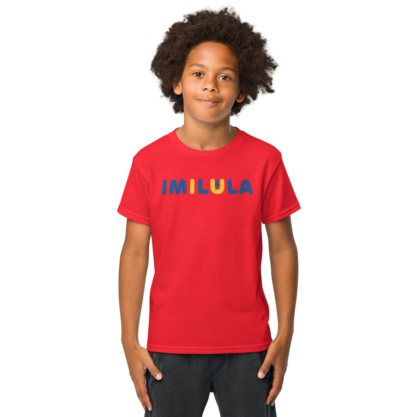 Child wearing a red t-shirt with colorful text on a white background