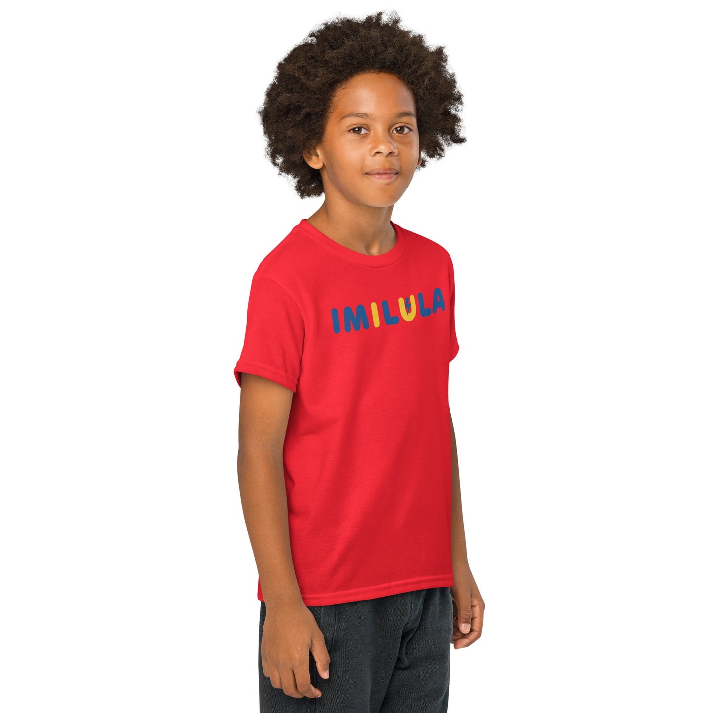 Child wearing a red t-shirt with colorful text on a white background